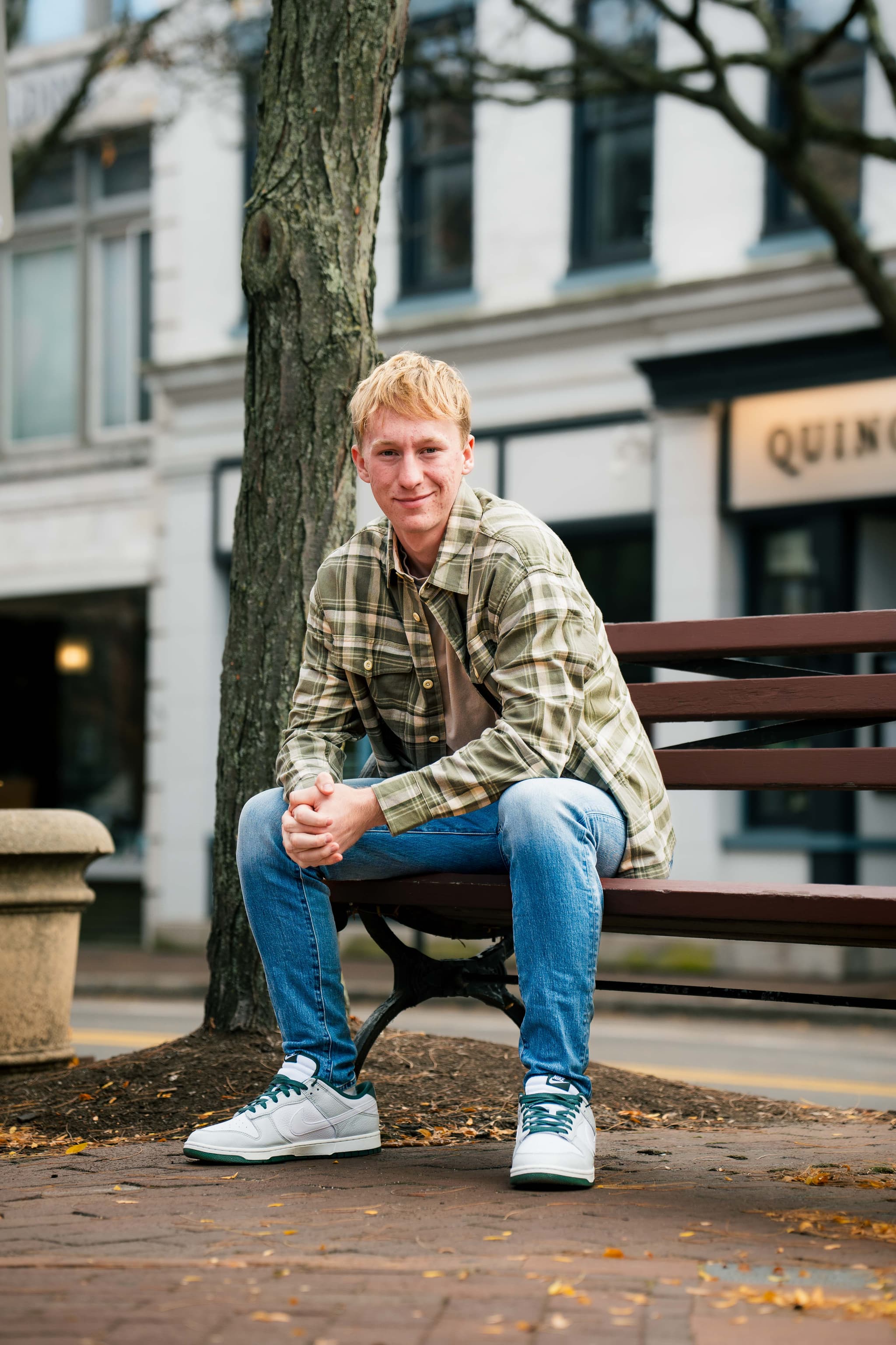Jack N. senior portrait on a Corning, New York street